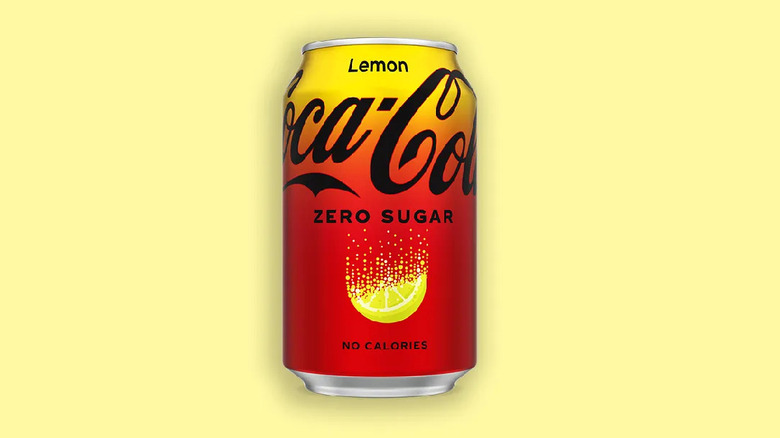 Coca-Cola Lemon can on a light-yellow background