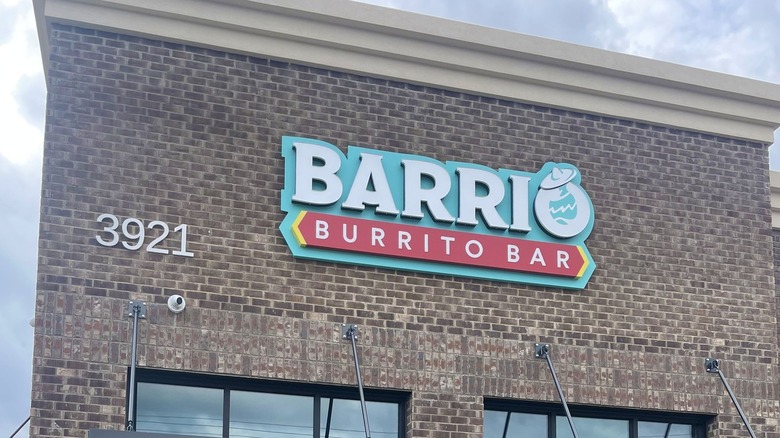 The exterior of a Barrio Burrito Bar location during the day