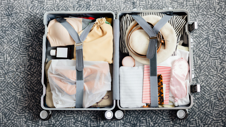 Opened, neatly-packed suitcase