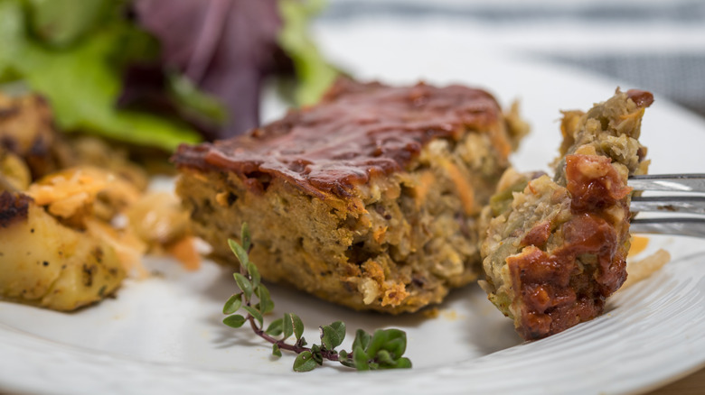 Vegetarian lentil loaf sliced with gravy