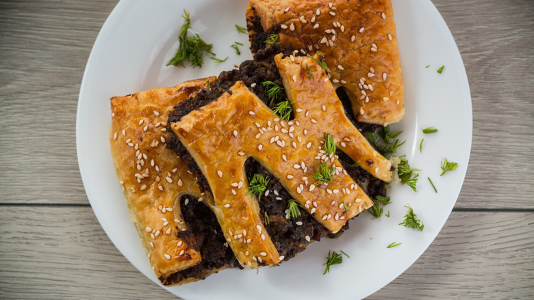 Golden puff pastry stuffed with mushrooms