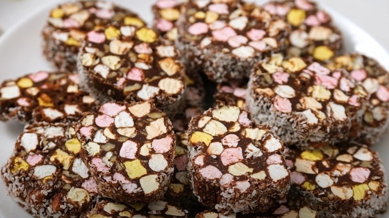 Pile of colorful chocolate church window cookies on plate