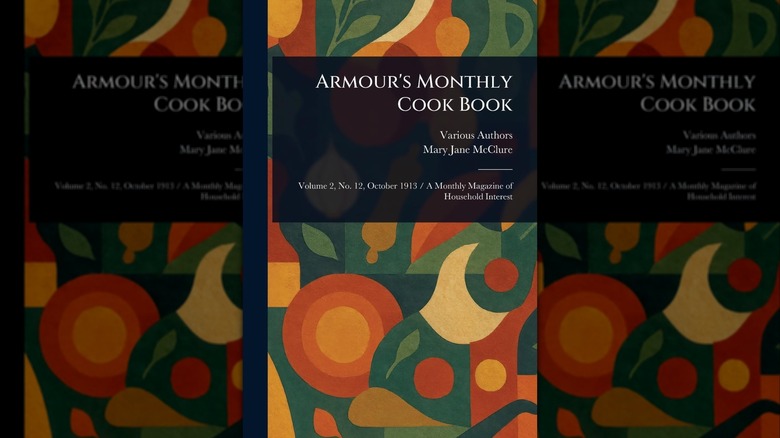 Mirrored image of red Armour's Monthly Cook Book against white background