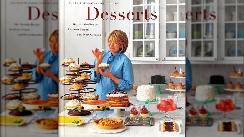 Cover of Desserts, featuring Stewart in a kitchen with an assortment of cakes, pies, tarts etc.