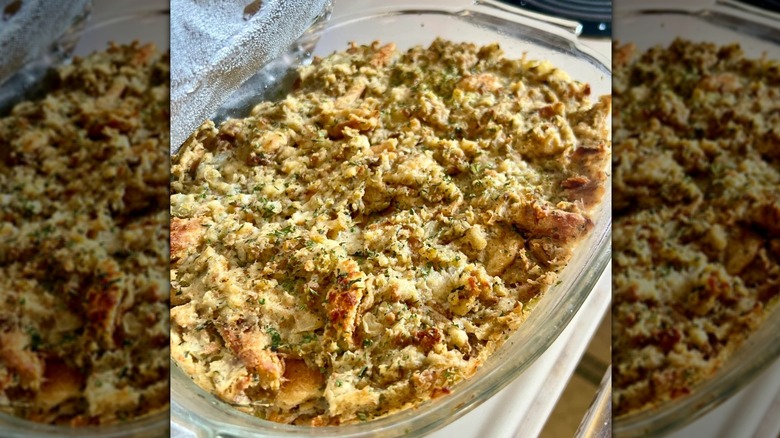 Pennsylvania Dutch potato filling in a glass dish on a stove