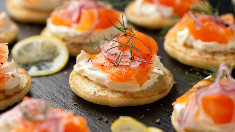 Smoked salmon blinis with cream cheese and dill