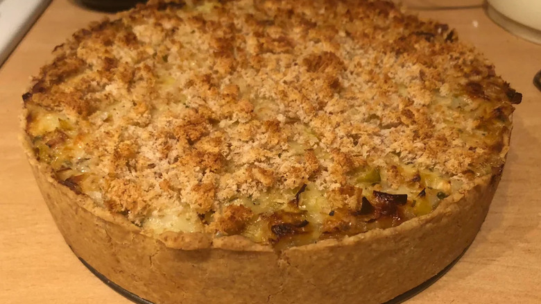 Round homity pie on brown countertop, close up