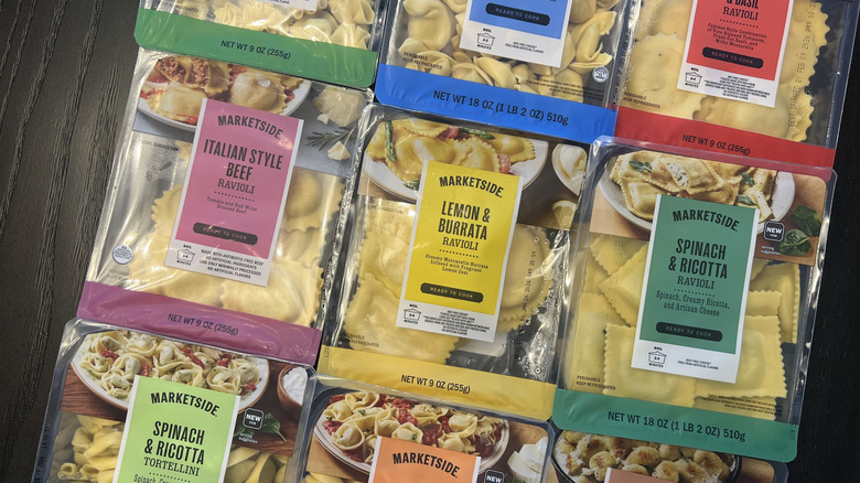 Walmart Marketside pastas in packages lined up on table.
