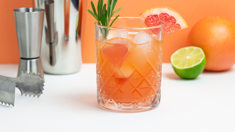 A non-alcoholic paloma garnished with grapefruit
