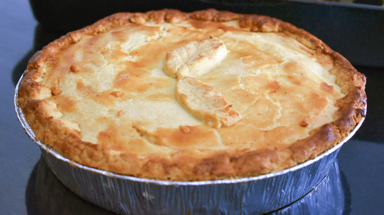 Baked pot pie in foil case