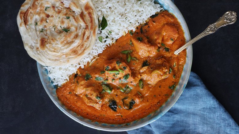 Photo of curry with white rice