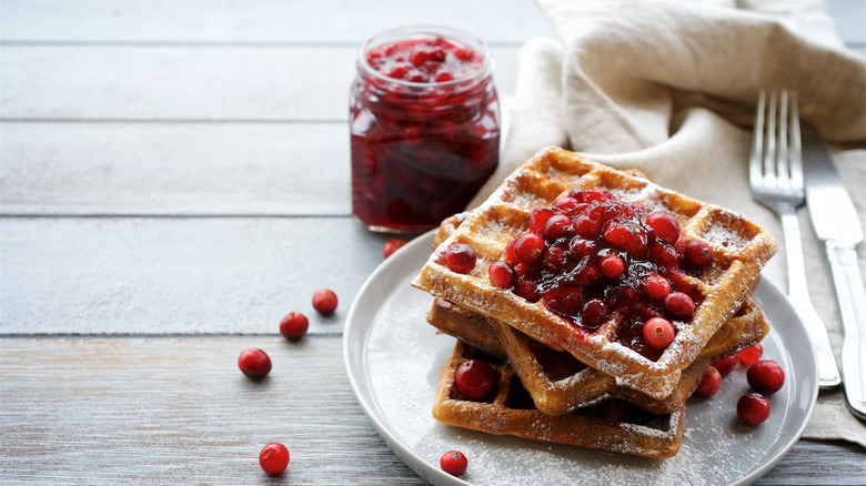 Waffles stacked with cranberry sauce