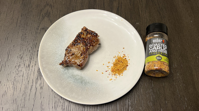 Weber roasted garlic and herb seasoning on steak.