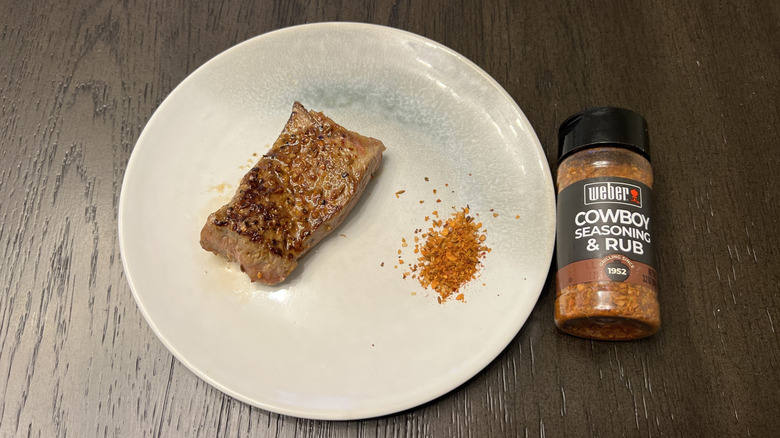 Weber Cowboy seasoning and rub on steak.
