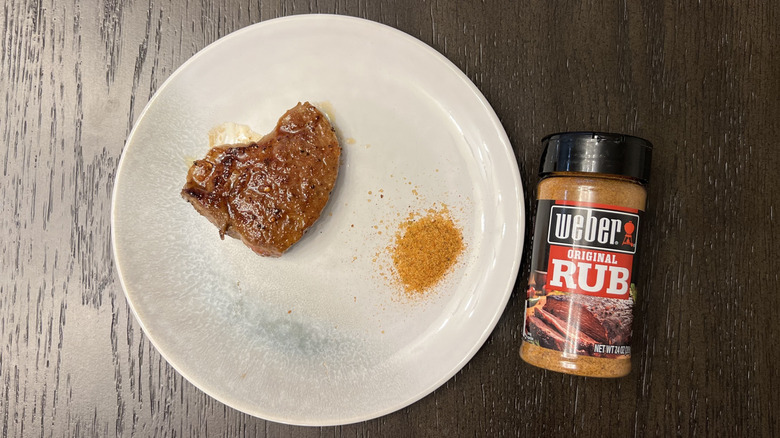 Weber original rub on steak.