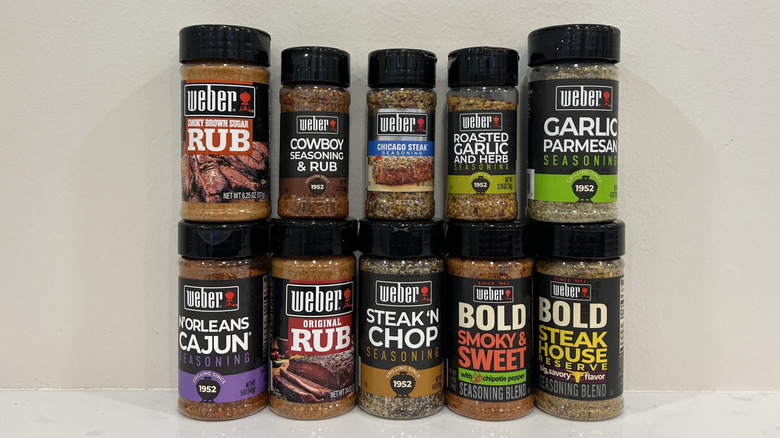 10 different Weber steak seasonings in plastic bottles.