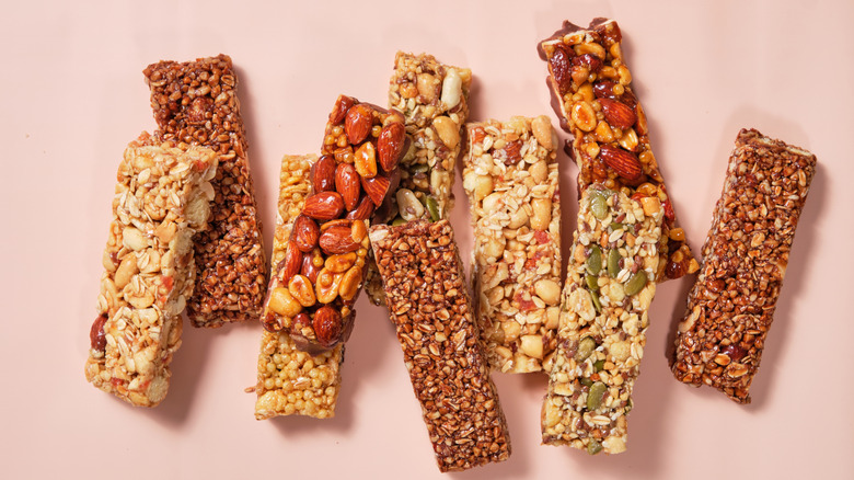 Homemade energy bars on a pink background