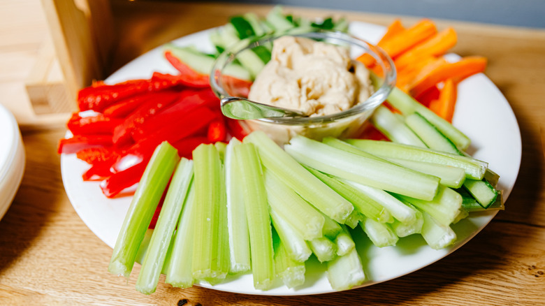 Hummus platter with colorful veggie sticks