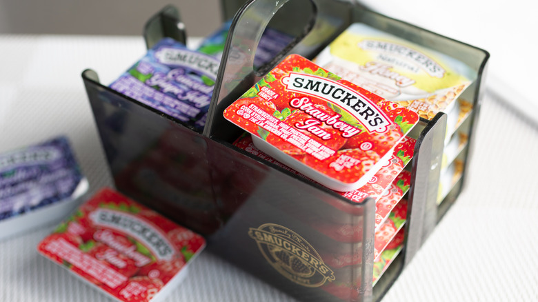 A caddy of single-serving Smucker's jams and jellies