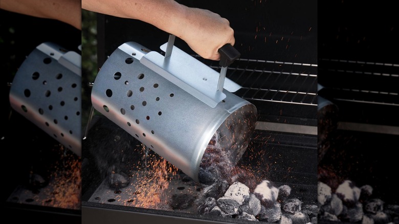 The Expert Grill Charcoal Chimney Starter pouring hot coals in the grill
