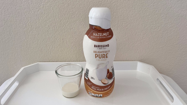 Delightfully Pure Hazelnut Coffee Creamer in glass