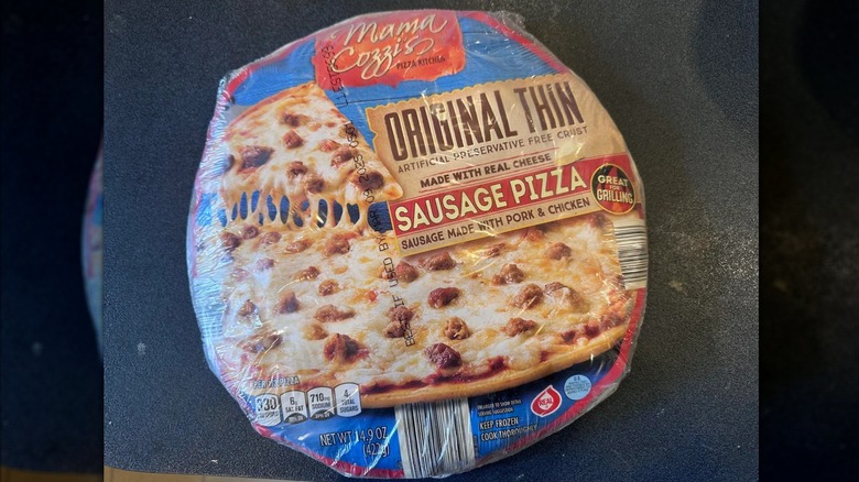 Mama Cozzi's sausage pizza in plastic packaging