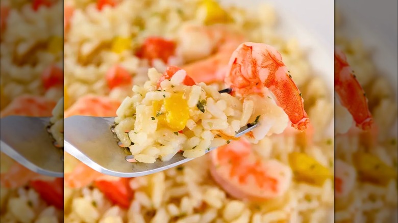 Closeup of Scott & Jon's Garlic Butter Shrimp Rice Bowl on a fork