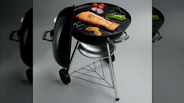 Weber Jumbo Joe charcoal grill grilling salmon and veggies