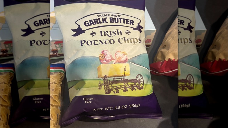Purple and white package of Trader Joe's Garlic Butter Irish Potato Chips