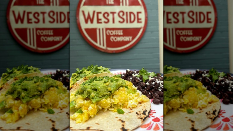Breakfast tacos with store sign behind