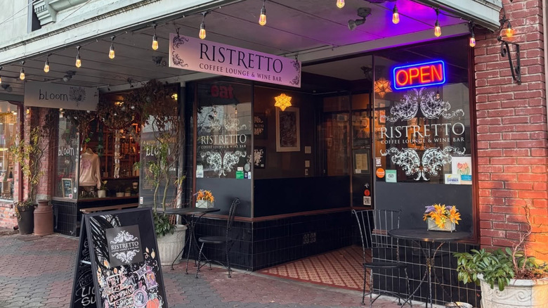 Ristretto Coffee Lounge brick exterior with neon open sign
