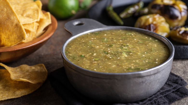 Green salsa in grey bowl
