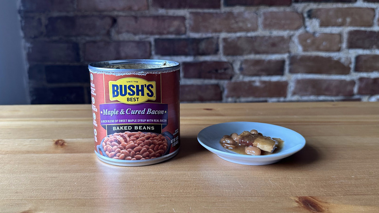 Bush's Maple and Cured Bacon baked beans on wooden table
