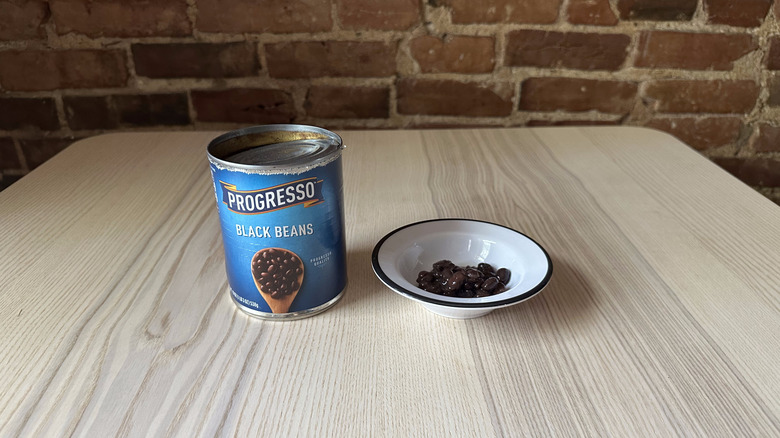 Progresso black beans in small white bowl