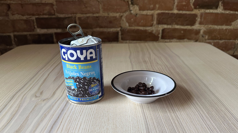 Goya black beans in small white bowl