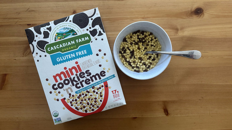 Gluten Free Mini Cookies 'n' Creme Cereal from Cascadian Farm box with some served in white bowl on table