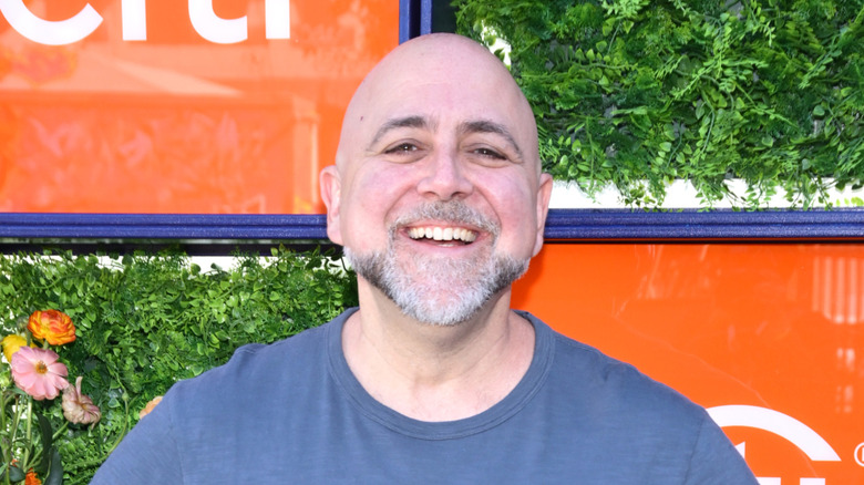 Duff Goldman smiling at a culinary event
