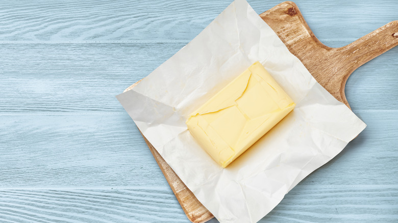 Butter on white wrapper with blue background