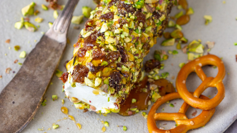 Herb cheese log with pretzels