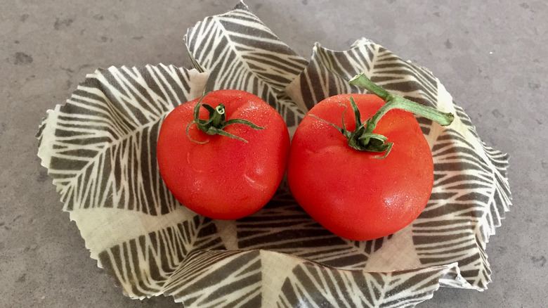 Two tomatoes on beeswax food wrap