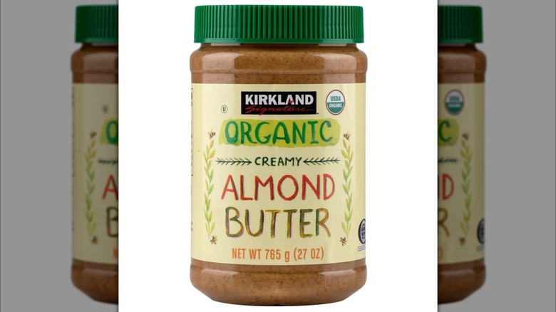 Plastic jar of almond butter