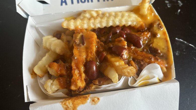 Chili cheese fries in container