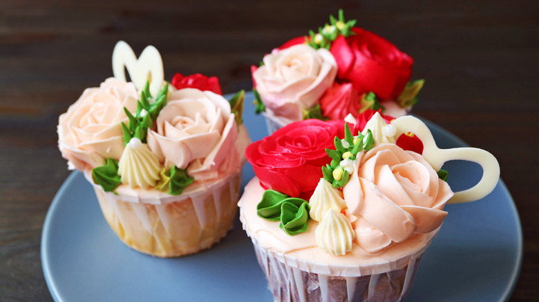 cupcakes decorated with floral designs