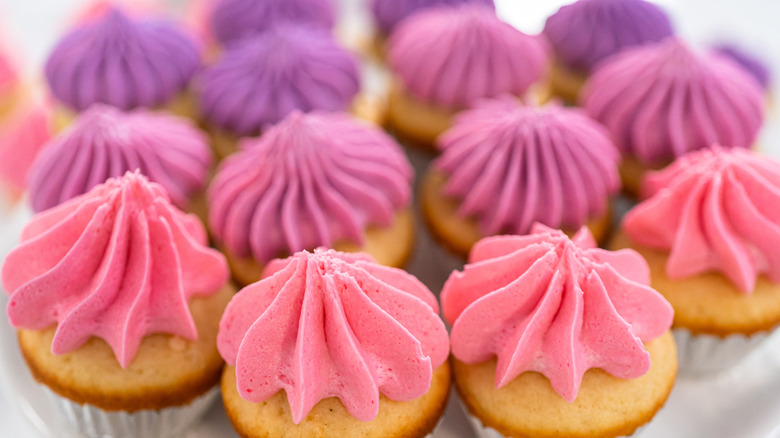 rows of different colors of cupcakes