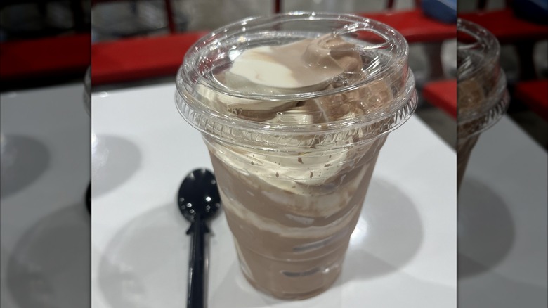 Frozen yogurt in a takeaway cup