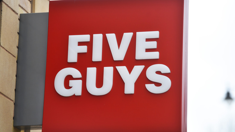 Exterior sign of Five Guys location