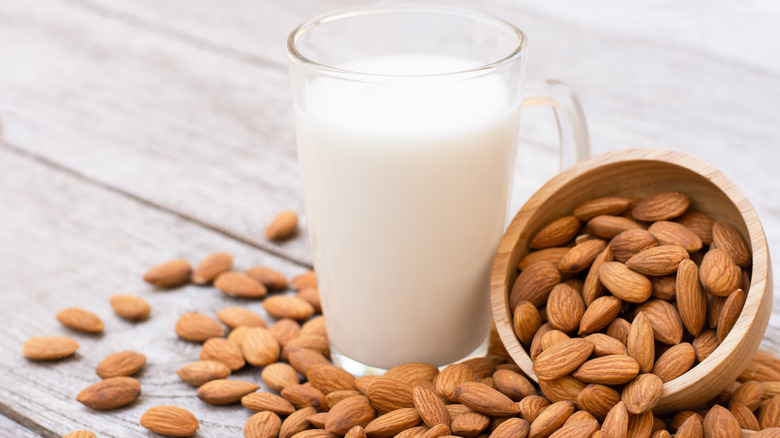 Almonds with a glass of almond milk