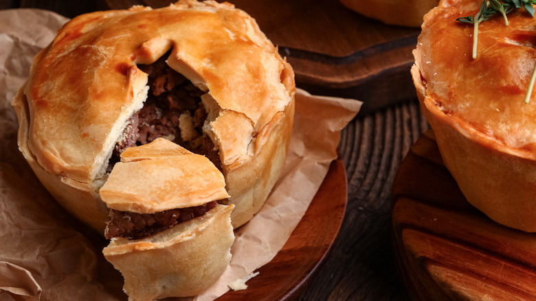Meat pies on plates