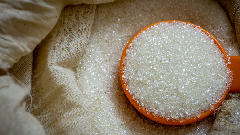 Sugar crystals in a burlap sack