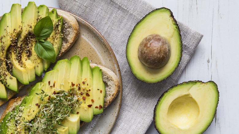 avocado toast and halved avocado